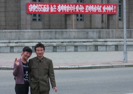North Korean couple posing in Kim il Sung square, Pyongan Province, Pyongyang, North Korea