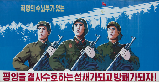 North Korean propaganda billboard depicting soldiers with guns, Pyongan Province, Pyongyang, North Korea
