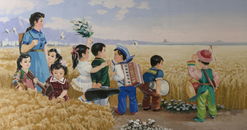 Propaganda poster depicting North Korean children in a field, Pyongan Province, Pyongyang, North Korea