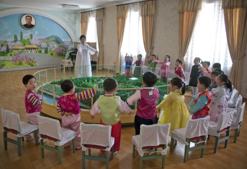 North Korean children having a lesson about Kim il sung's life in Kim Jong suk school, Pyongan Province, Pyongyang, North Korea
