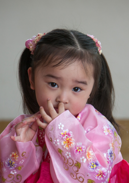Portrait of a shy North Korean girl, Pyongan Province, Pyongyang, North Korea