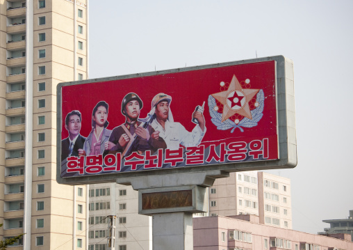 North Korean propaganda billboard with the flag of the supreme commander of the Korean people's army, Pyongan Province, Pyongyang, North Korea