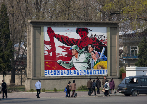 North Korean propaganda poster depicting workers and soldiers, Pyongan Province, Pyongyang, North Korea
