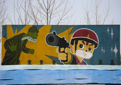 Propaganda billboard for a shooting range in Taesongsan funfair, Pyongan Province, Pyongyang, North Korea
