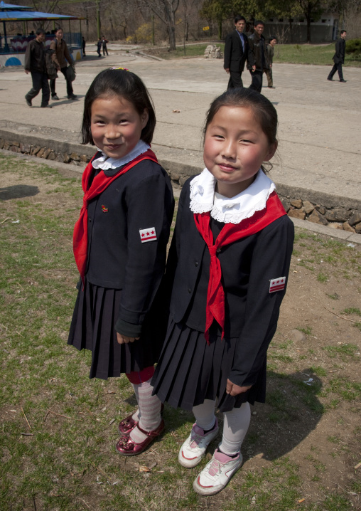 North Korean pioneer girls in a park, Pyongan Province, Pyongyang, North Korea