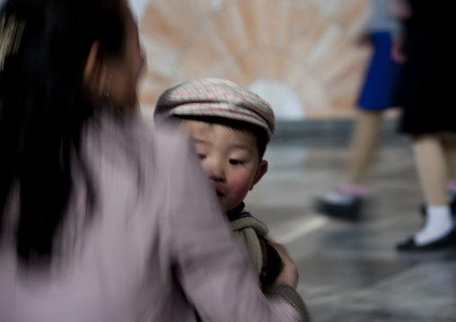 North Korean mother holding her child boy in her arms, Pyongan Province, Pyongyang, North Korea