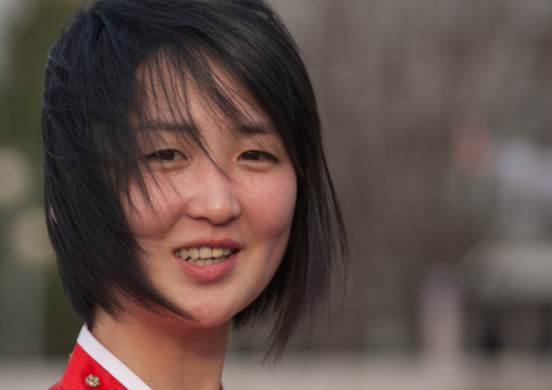 Portrait of a smiling North Korean woman, Pyongan Province, Pyongyang, North Korea