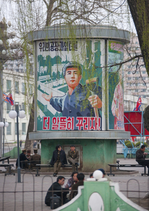Propaganda billboard in a park depicting a worker, Pyongan Province, Pyongyang, North Korea