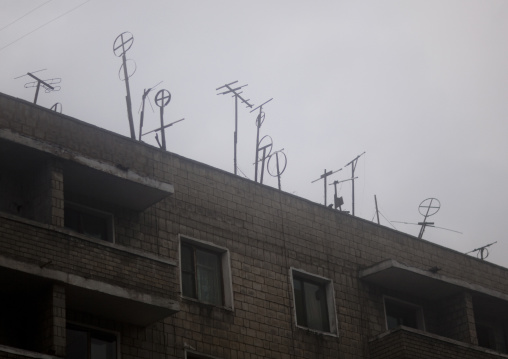 Television antennas on a dilapidated building, Pyongan Province, Pyongyang, North Korea
