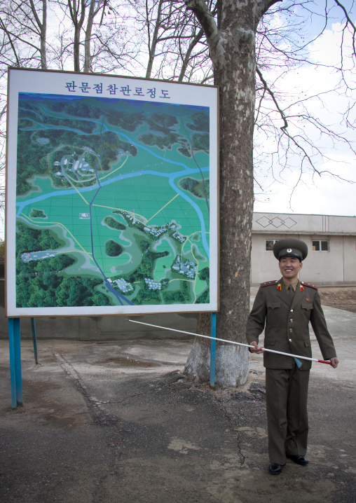 North Korean soldier in the joint security area in front of the map of the Demilitarized Zone, North Hwanghae Province, Panmunjom, North Korea