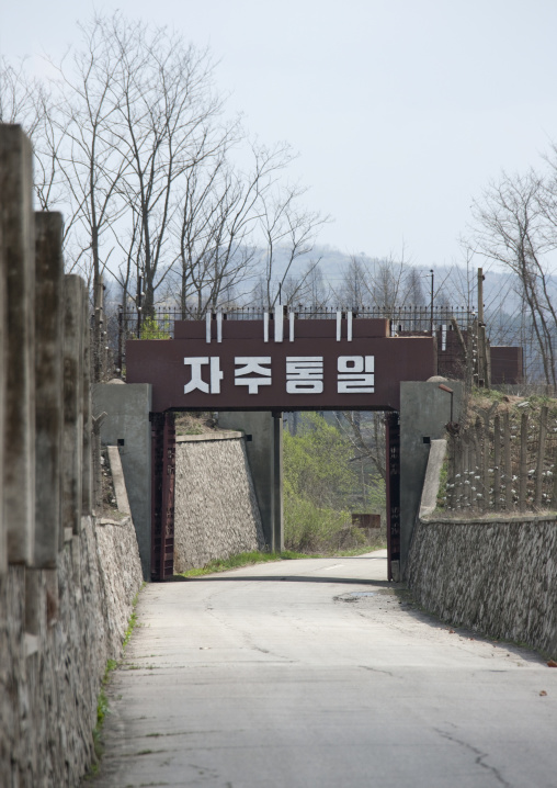 North Korean anti tank invasion concrete blocks on the roadside on the Demilitarized Zone, North Hwanghae Province, Panmunjom, North Korea