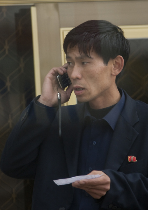 North Korean man calling with his mobile phone, North Hwanghae Province, Kaesong, North Korea