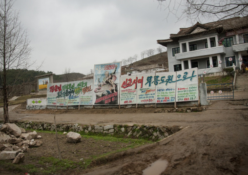 Row of North Korean propaganda billboards in the countryside, North Hwanghae Province, Kaesong, North Korea