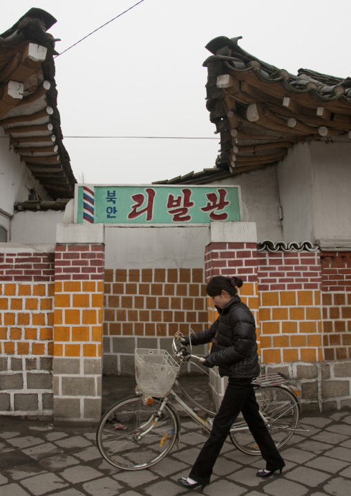 North Korean people walking in a street in the old town, North Hwanghae Province, Kaesong, North Korea