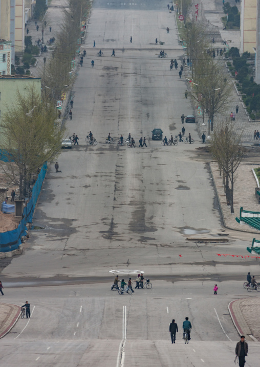 North Korean people crossing a large road, North Hwanghae Province, Kaesong, North Korea