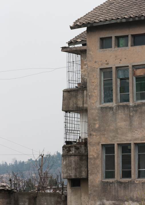 Decrepit balconies of a building, North Hwanghae Province, Kaesong, North Korea