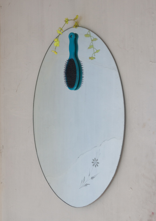 Hairbrush and mirror in a house, North Hwanghae Province, Kaesong, North Korea