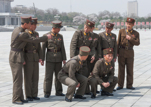 North Korean soldiers posing for a photo in Kumsusan memorial palace, Pyongan Province, Pyongyang, North Korea
