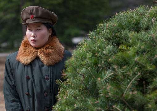 North Korean guide with a fur coat, Hyangsan county, Mount Myohyang, North Korea