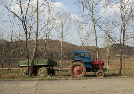 Tractor at the edge of the road, Pyongan Province, Pyongyang, North Korea