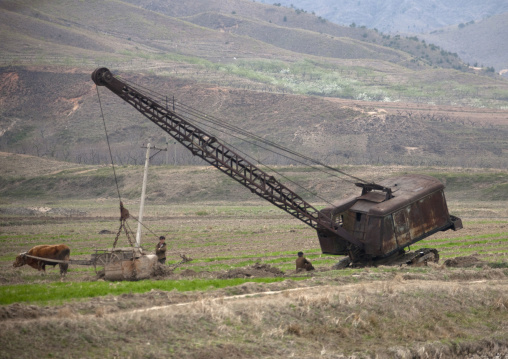 Dilapidated crane in a field, Kangwon Province, Wonsan, North Korea