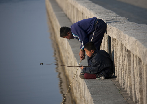 North Korean children fishing, Kangwon Province, Wonsan, North Korea