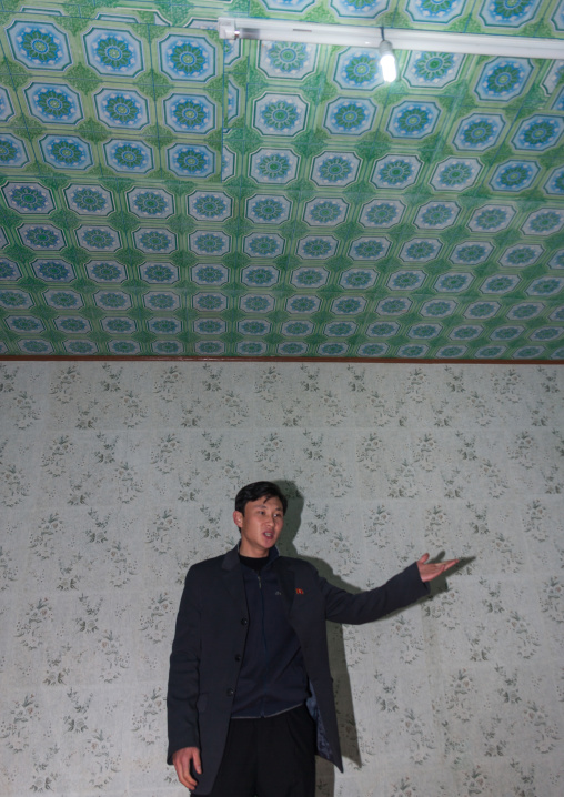 North Korean man singing inside a house, North Hamgyong Province, Jung Pyong Ri, North Korea
