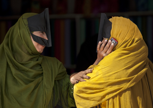 Two Bedouin Women Talking In Mobile Phone, Sinaw, Oman