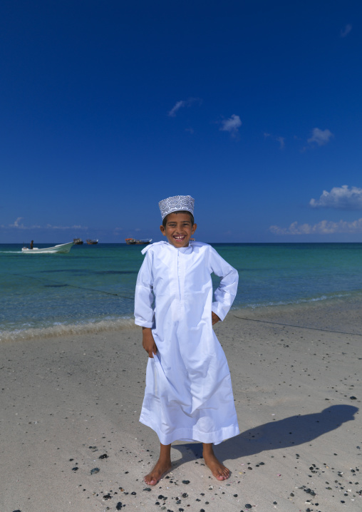 Boy Standing On The Beach Happily, Masirah Island, Oman