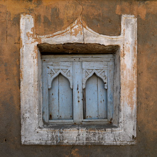 Blue Wooden Window In Arabic Style Of An Old House, Mirbat, Oman