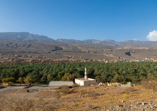 Mosque in front of an old village in an oasis, Ad Dakhiliyah Region, Al Hamra, Oman