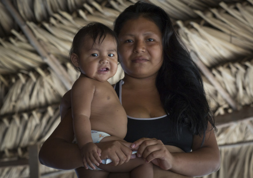Panama, Darien Province, Puerta Lara, Wounaan Tribe Mother Holding Her Baby