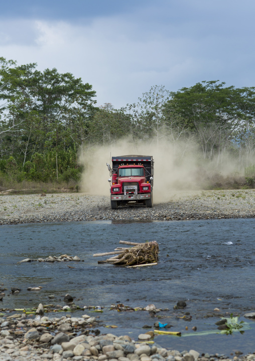 Panama, Darien Province, Bajo Chiquito, Logging Truck Crossing A River With Trunks