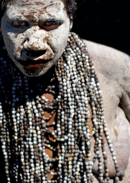 Portrait of a mourning woman with job tears necklaces, Western Highlands Province, Mount Hagen, Papua New Guinea