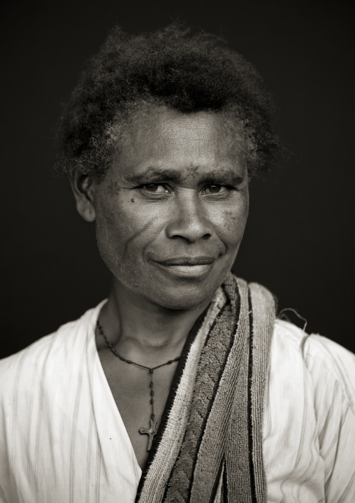 Portrait of a local woman with tattoos on the face, New Ireland Province, Langania, Papua New Guinea