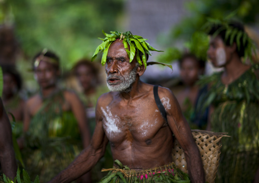 Old man during malagan tatuana masks dance, New Ireland Province, Langania, Papua New Guinea