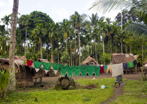 Clothes drying in the sun in a traditional village, Milne Bay Province, Trobriand Island, Papua New Guinea