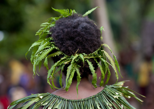 Woman with vegetal headwear, New Ireland Province, Langania, Papua New Guinea