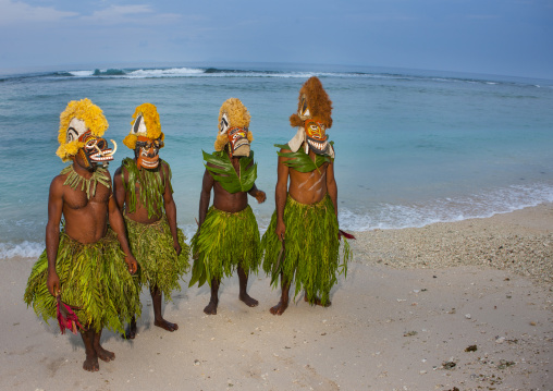 Malagan tatuana masks on a beach, New Ireland Province, Langania, Papua New Guinea
