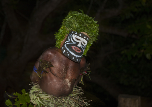 Man during a Malagan tatuana masks dance, New Ireland Province, Langania, Papua New Guinea
