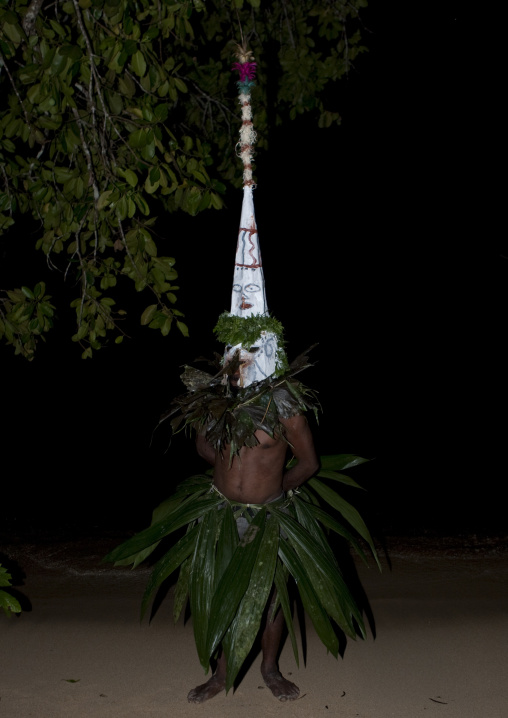 Man with a giant headwear during a Malagan tatuana masks dance, New Ireland Province, Langania, Papua New Guinea