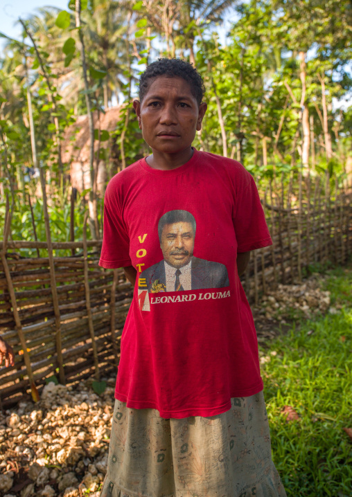 Portrait of a woman with a political propaganda tshirt, Milne Bay Province, Trobriand Island, Papua New Guinea