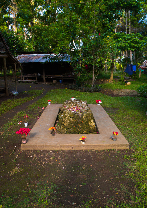 Grave in the middle of a village, Milne Bay Province, Trobriand Island, Papua New Guinea
