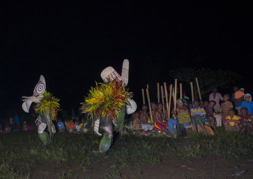 Dancers with giant masks during a Baining tribe fire ceremony, East New Britain Province, Rabaul, Papua New Guinea