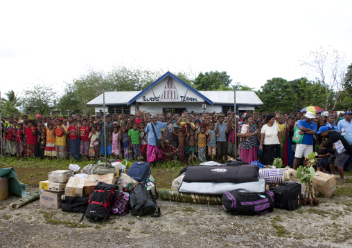 Crowd at the airport waiting for the plane arrival, Milne Bay Province, Trobriand Island, Papua New Guinea