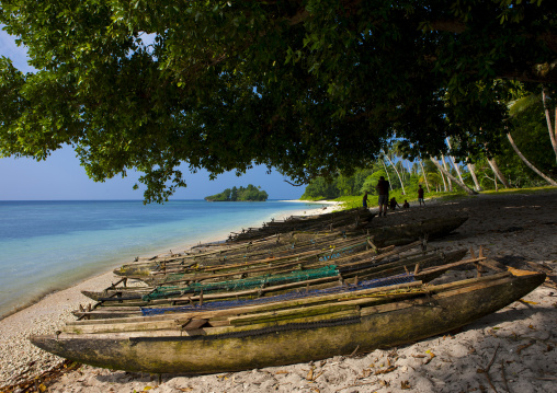 Boats on beautiful deserted kaibola beach, Milne Bay Province, Trobriand Island, Papua New Guinea