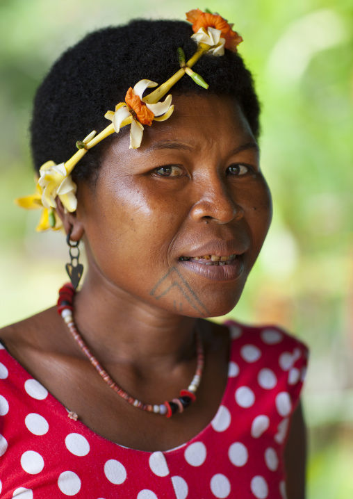 Portrait of an islander woman with a floral crown, Milne Bay Province, Trobriand Island, Papua New Guinea