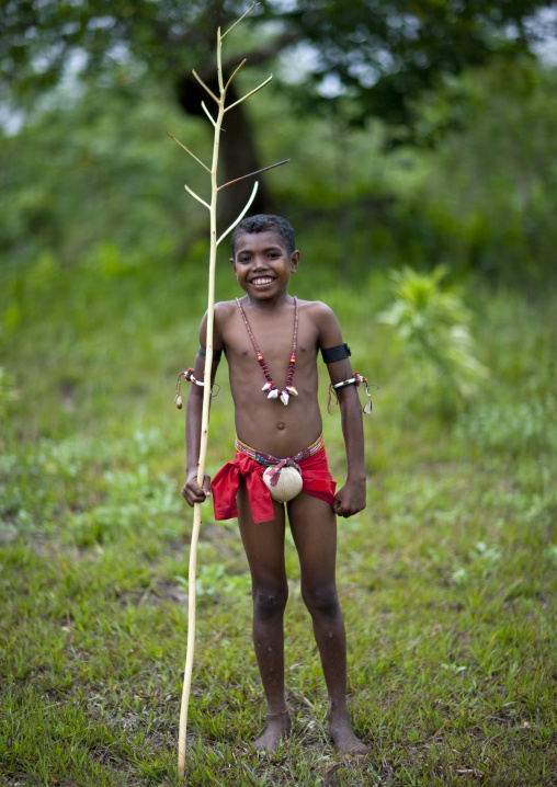Boy in traditional clothing during a ceremony, Milne Bay Province, Trobriand Island, Papua New Guinea