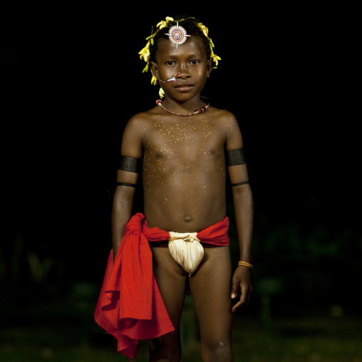 Boy tribal dancer in traditional cothing, Milne Bay Province, Trobriand Island, Papua New Guinea