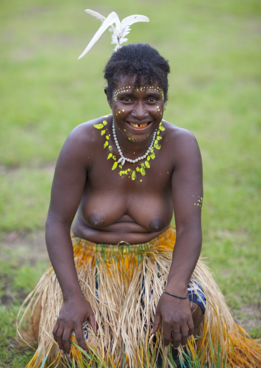 Portrait of a smiling topless tribal woman in traditional clothing, Autonomous Region of Bougainville, Bougainville, Papua New Guinea